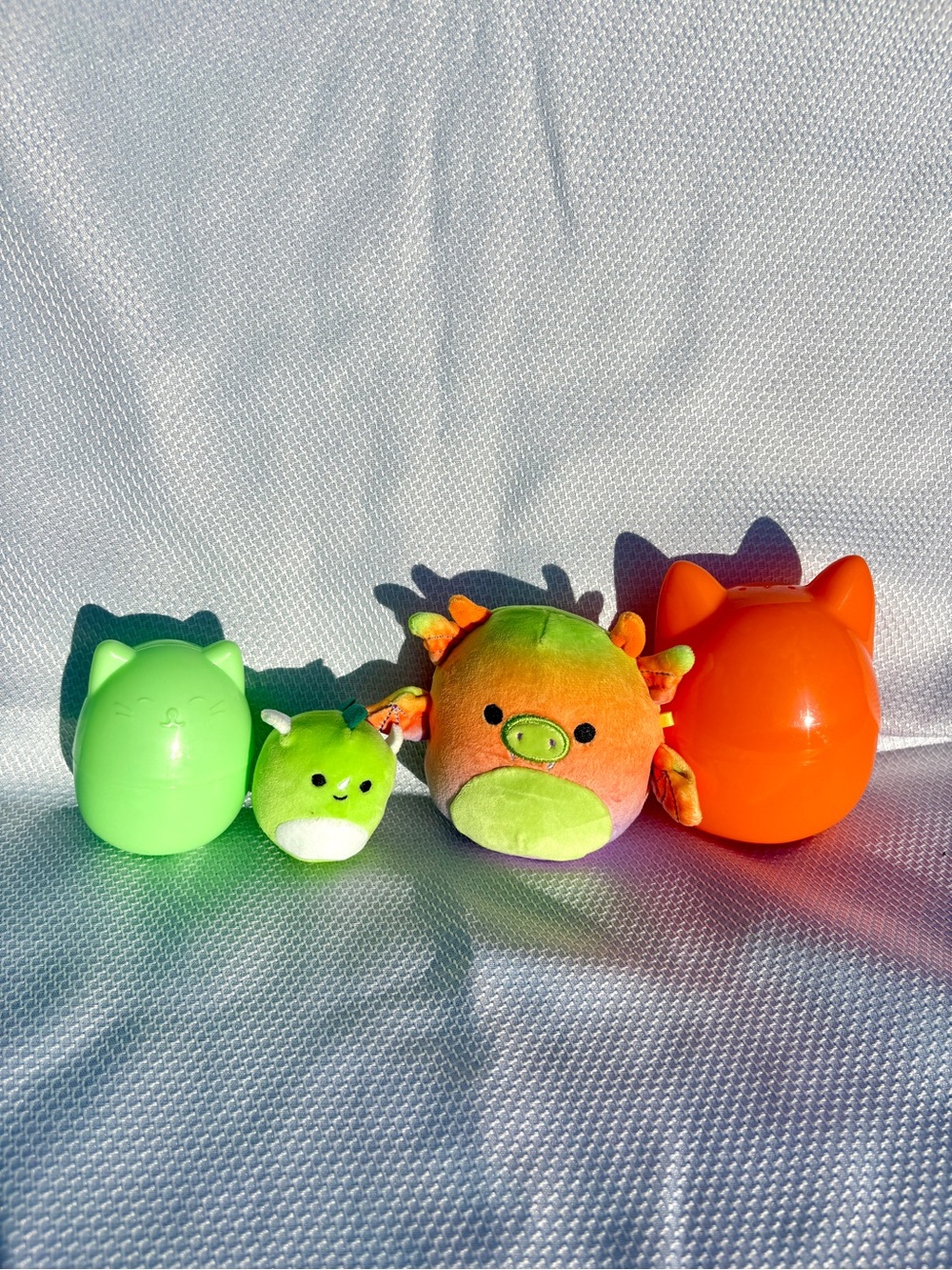 Squishmallows green Danny Dinosaur and orange Dionne Gargoyle
